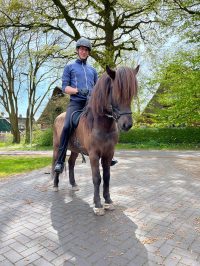 Dennis & Ìsak​ Happy Horse Owner